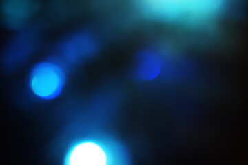 background with bokeh particles blue