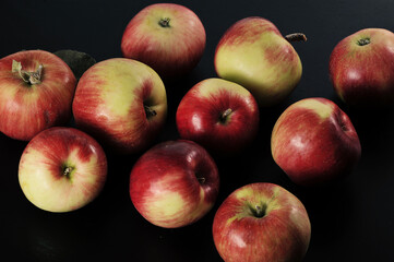 red ripe apples on a plate