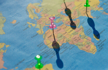 Location Pin on Algeria on a World Map. Global Mapping. Close up. Table top view. Selective focus. Shallow depth of field.