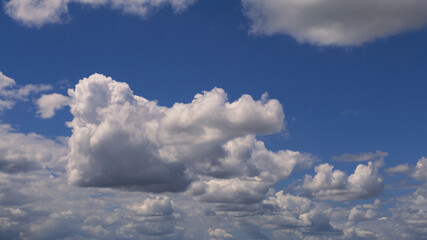 Cumulus clouds with blue sky on a sunny day of summer. Beautiful cloudscape