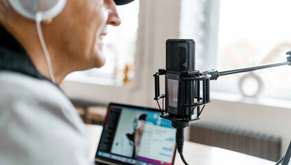 Live broadcast recording of the podcast show. A blogger on the radio communicates with listeners. A...