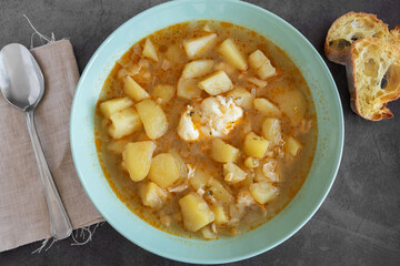 Traditional Spanish recipe potato stew with egg