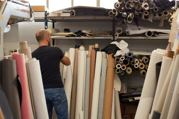 book binder working in a workshop