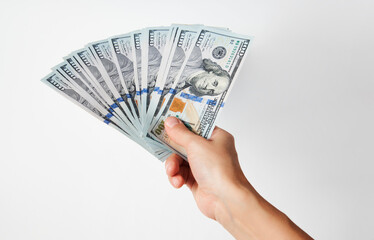 Hand with money isolated on white background