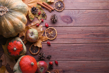 Autumn nature background border with food, flora and fauna on wooden background. Top view. Harvest...