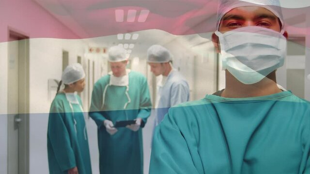 Animation of flag of netherlands waving over surgeons in operating theatre
