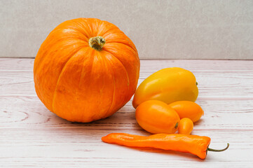 Orange vegetables - pumpkin, peppers, carrots and tomatoes. Orange vegetables are a source of...