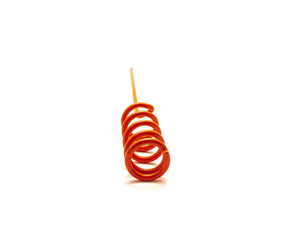 Zoom in part of red powdered coated steel finish spiral rod pole holder bank fishing gear isolated on white