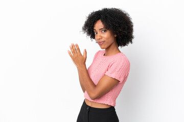 Young African American woman isolated on white background scheming something