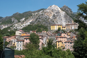 Fototapeta na wymiar Fraction of Torano in Carrara, a Country nestled in the environment of the Marble Quarries, Tuscany - Italy