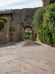 Back Access Door and Outer Walls of the Medieval Village of Monteriggioni in Siena, Tuscany - Italy