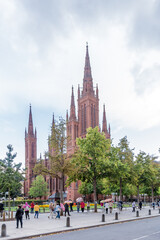 Naklejka premium Wiesbaden, Germany. Tourists near the Protestant Marktkirche (market church), 19th century