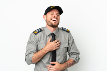 Young security Brazilian man isolated on white background smiling a lot