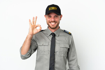 Young security Brazilian man isolated on white background showing ok sign with fingers