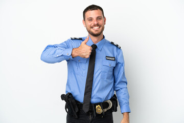 Young police Brazilian man isolated  on white background giving a thumbs up gesture