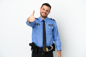 Young police Brazilian man isolated  on white background shaking hands for closing a good deal