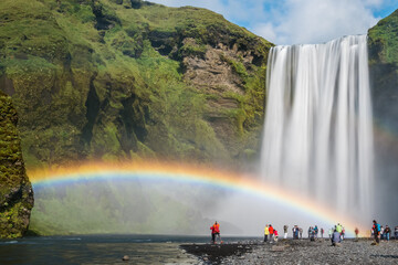 Sunny summer day at Skogafoss waterfall in Iceland