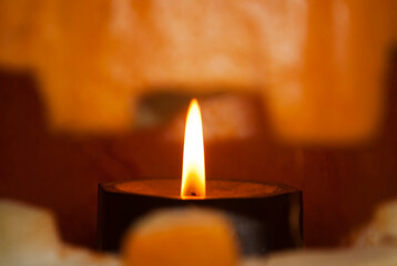 Burning candle in jack lantern. Halloween celebration. Selective focus. 