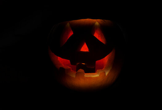 Halloween pumpkin with scary face on black background,jack lantern.