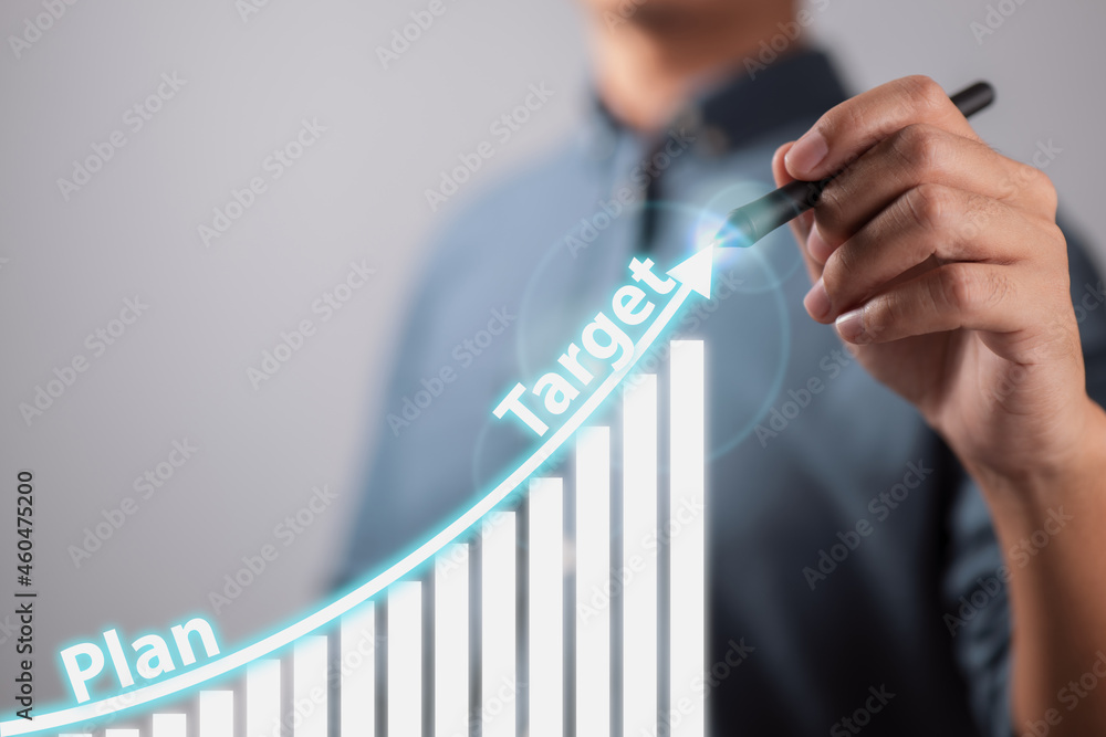 Poster businessman draws an increasing trend arrow and a rising chart from plan to goal. it is a representa