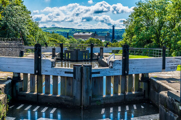 A view down the Five Locks network on the Leeds, Liverpool canal at Bingley, Yorkshire, UK in summertime