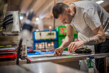 Professional worker technician machinist work in factory production workplace