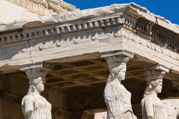 Caryatids, beautiful girls of classical Athens at the top of the Acropolis. Erechtheion, Athens,...