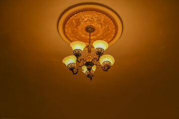 ceiling chandelier with five lights in vintage design.