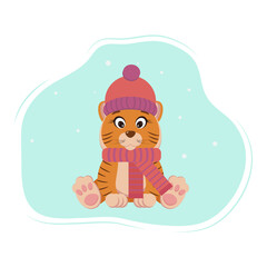 cute tiger is sitting in a hat and scarf and snowing