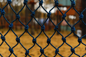 Fototapeta premium Dynamic rope net for obstacle or safety during sports training.