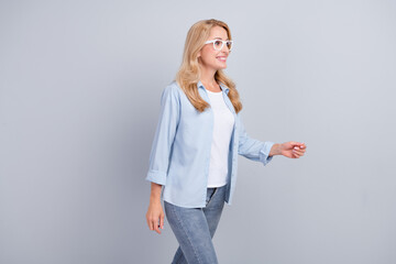 Profile photo of confident worker lady enjoy walk wear eyeglasses blue shirt isolated grey color background