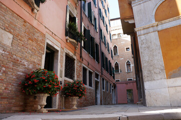 Tourist atmosphere of ancient Venice - the city of canals, gondolas and ancient architecture