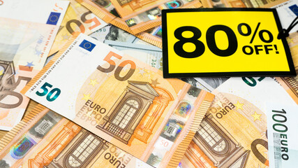 Yellow sale label on money euro background. Black friday sale. European money