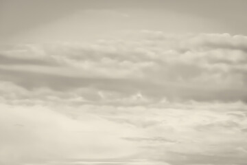 Gray and white fluffy clouds. Cloudy sky. White and gray texture background for sad, death,...