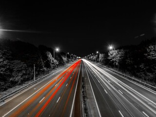 Fototapeta na wymiar Lights of cars on the motorway 