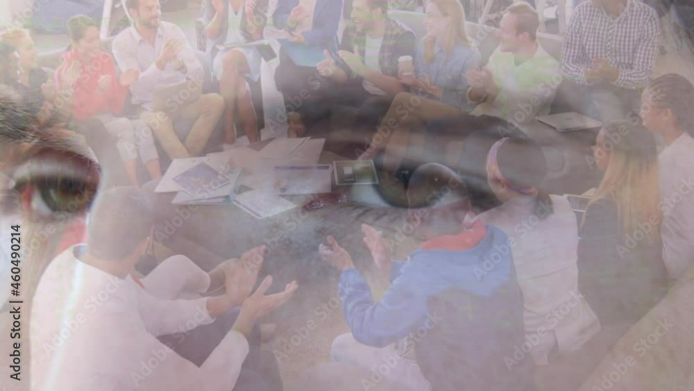 Poster Animation of man's face and data processing over smiling business colleagues clapping