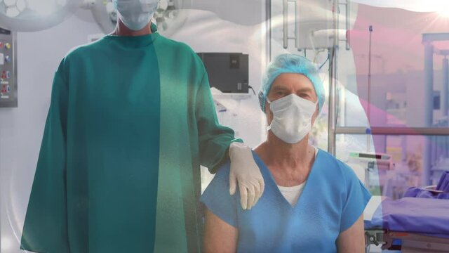 Animation of flag of france waving over surgeons in operating theatre