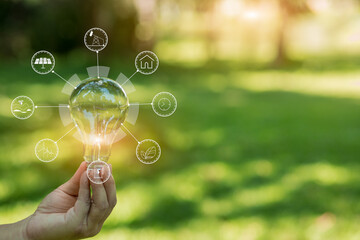 Light bulb Energy saving green nature background
