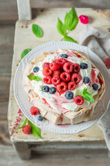 Tasty Pavlova cake made of mascarpone cream.