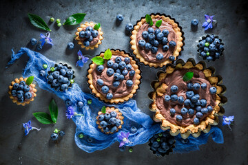 Delicious mini tart with raspberries and cream.