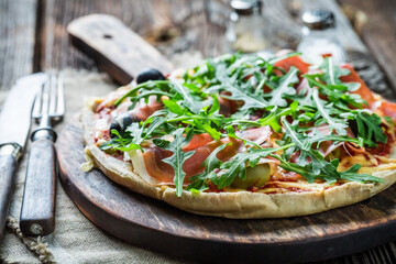 Tasty pizza with tomatoes and basil. Pizza with mozzarella.