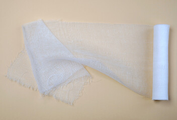 Bandage on a beige background. Traumatology