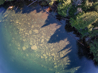 Aerial Looking down on lake shoreline