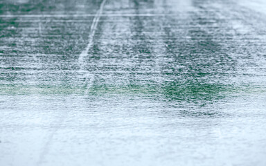 rainy background of wet pavement or asphalt road during rainy weather