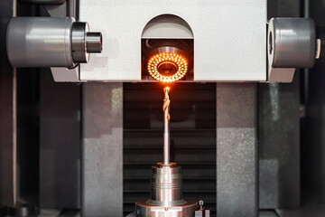cutting drill bit assembly with chuck or tool holder setting on tool presetting and measuring...