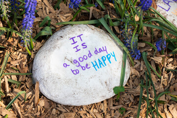 insprational quote on stone it is a good day to be happy