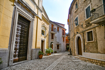 Fototapeta na wymiar A narrow street of Cusano Mutri, a medieval town of Benevento province, Italy.