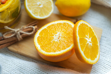 Obraz na płótnie Canvas Oranges, lemons, spices and hot fruit tea.