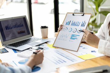 Atmosphere in the meeting room of a startup, the Chief Financial Officer is presenting the company's financial summary to the executives. Concept of financial management of startup companies.