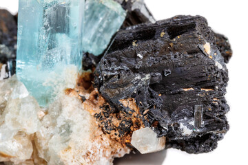Macro mineral stone Aquamarine and black tourmaline, Schorl on a white background